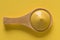 Yellow Mustard on a Wood Spoon