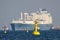 YELLOW NAVIGATION SIGN AND LNG TANKER