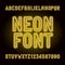 Yellow neon tube alphabet font. Neon color letters, numbers and symbols.