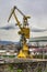 yellow old crane in a shipyard