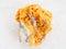 yellow Orpiment on dolomite stone on white