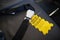 Yellow out of service warning sign tag attached on faulty damage defect plan safety seat belt