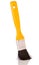 Yellow paintbrush isolated on white