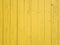 Yellow painted wooden textured background. Abstract wood wall. Copy space, empty template for text