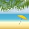 Yellow parasol at the beach under palm trees