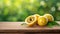 yellow passionfruit on wood with a blurred green background