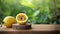 yellow passionfruit on wood with a blurred green background