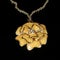 Yellow pendent in the form of a flower, costume jewelry, close up