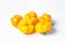 Yellow pepper on a white background. Several yellow peppers lie next to each other.