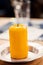 Yellow, perfumed candle