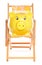 Yellow piggybank on deckchair