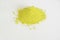 Yellow pigment isolated over white