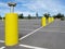 Yellow pillars with electrical plugs to connect the cars to heat up the engine and oil in extreme winter conditions in