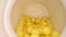 Yellow pills or capsules next to bottle on wooden table background. Drug prescription, treatment medication. Pharmaceutical