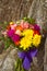 Yellow and pink wedding bouquet on a rock background