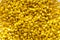 Yellow plastic granules