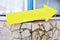 Yellow plastic informational sign arrow. Show the direction. Blank Sign post. Abstract yellow arrow direction sign