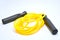 Yellow plastic sports jumping rope