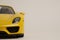 Yellow Porsche 918 Spyder model car front view half car