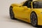 Yellow Porsche 918 Spyder model car side view