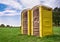 Yellow portable toilets