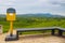 Yellow postbox on natural background