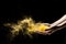 Yellow Powder Explosion in Woman\\\'s Hand, Black Background, Creative Abstract Art