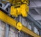 Yellow production crane beam, production crane for lifting cargo, close-up