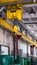Yellow production crane beam, production crane for lifting cargo, over
