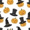 Yellow pumpkins in black witch hats. Halloween seamless pattern, vector illustration