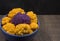 Yellow and purple cauliflower in a bowl