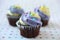 Yellow and purple easter cupcake colorful background