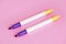 Yellow and purple stationery marker for writing and highlighting text