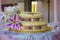 Yellow And Purple Trimmed Wedding Cake