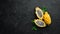 Yellow Pytahya on a black background. Fruit Dragon. Tropical Fruits. Top view.