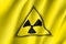 Yellow radiation sign triangle on yellow background