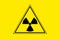 Yellow radiation sign triangle on yellow background, flat icon