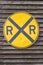 Yellow railroad crossing sign