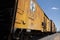 Yellow railroad freight cars
