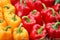 Yellow and red bell pepper group on rice straw for sale