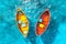Yellow and Red Fishing Boats Floating on Turquoise Water Ocean Top View
