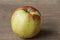 Yellow and red jonagold apples on wooden background