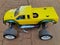 Yellow remote controled picup with big wheels