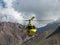 Yellow rescue helicopter in the mountains