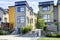 Yellow residential building with siding trim