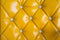 Yellow retro chesterfield style, capitone textile background