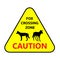 Yellow road sign: Fox Crossing Zone. Drive slowly for animal safety.