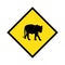 Yellow road sign: Tiger Crossing Zone. Drive slowly for animal safety.