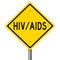 Yellow road sign warning for HIV/AIDS