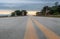 Yellow road stipes and blue sky